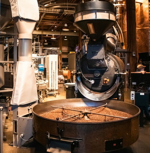 coffee-beans-roasting-in-an-industrial-machine-.jpg Coffee beans roasting in an industrial machine.